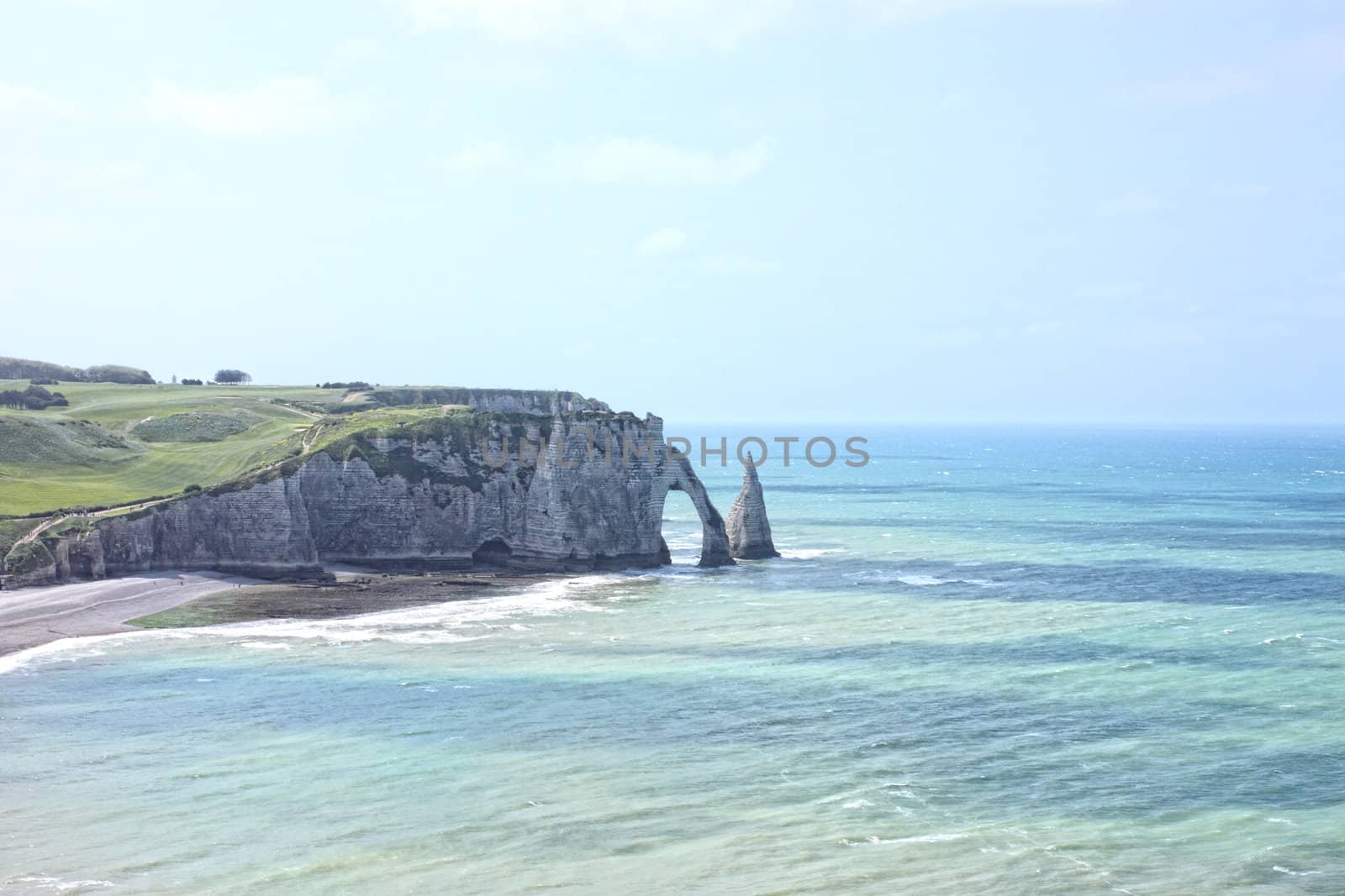 Beach with cliff Falaise d'Aval. Normandy, Cote d'Albatre, France. 