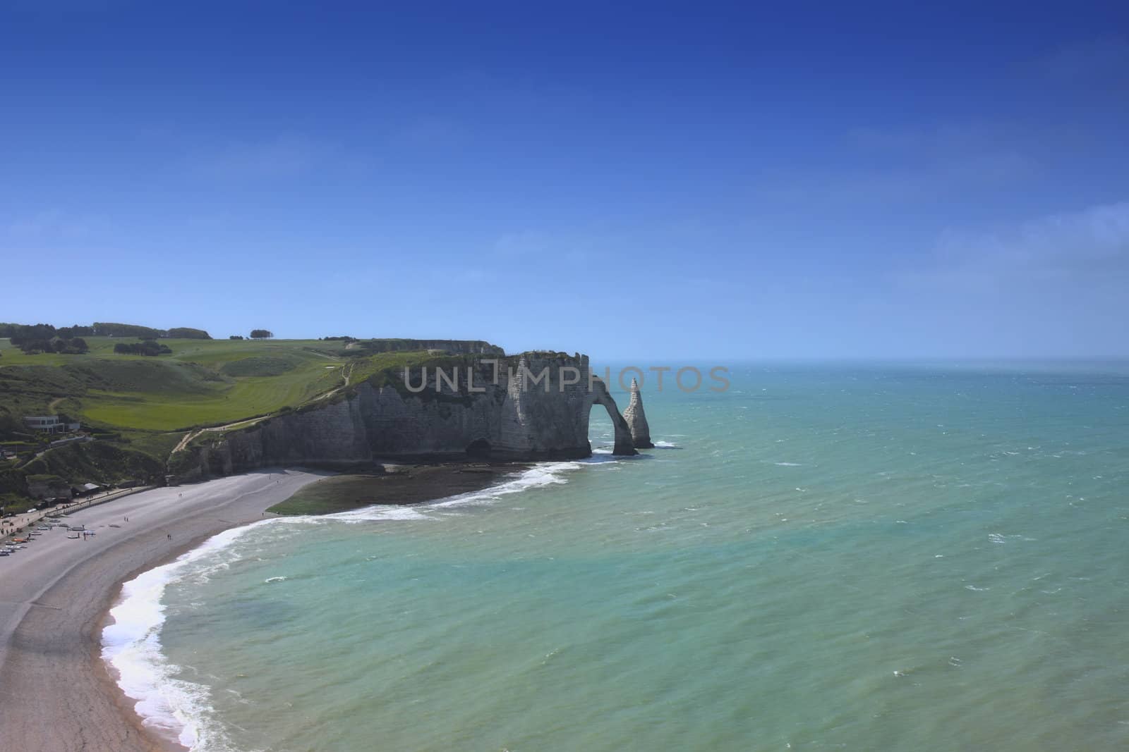 Beach with cliff Falaise d'Aval. Normandy, Cote d'Albatre, France. 