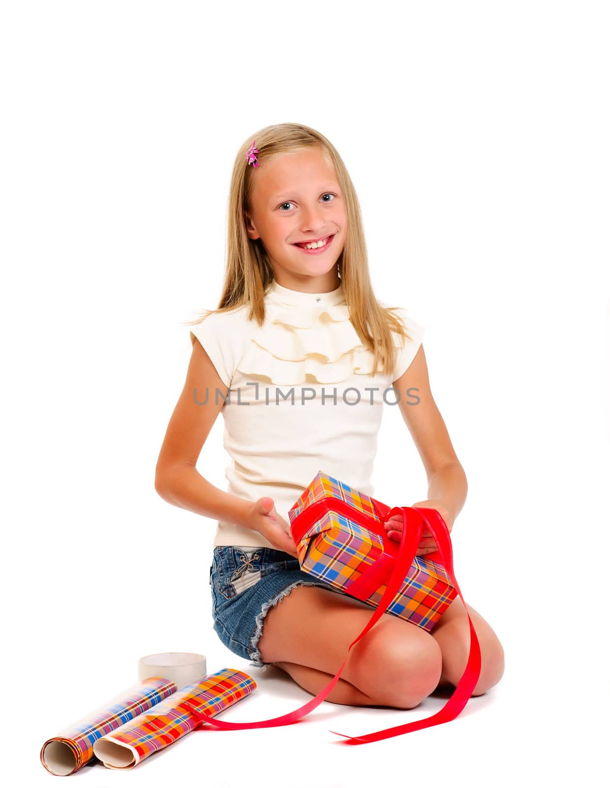 Girl with gift on a white background isolated