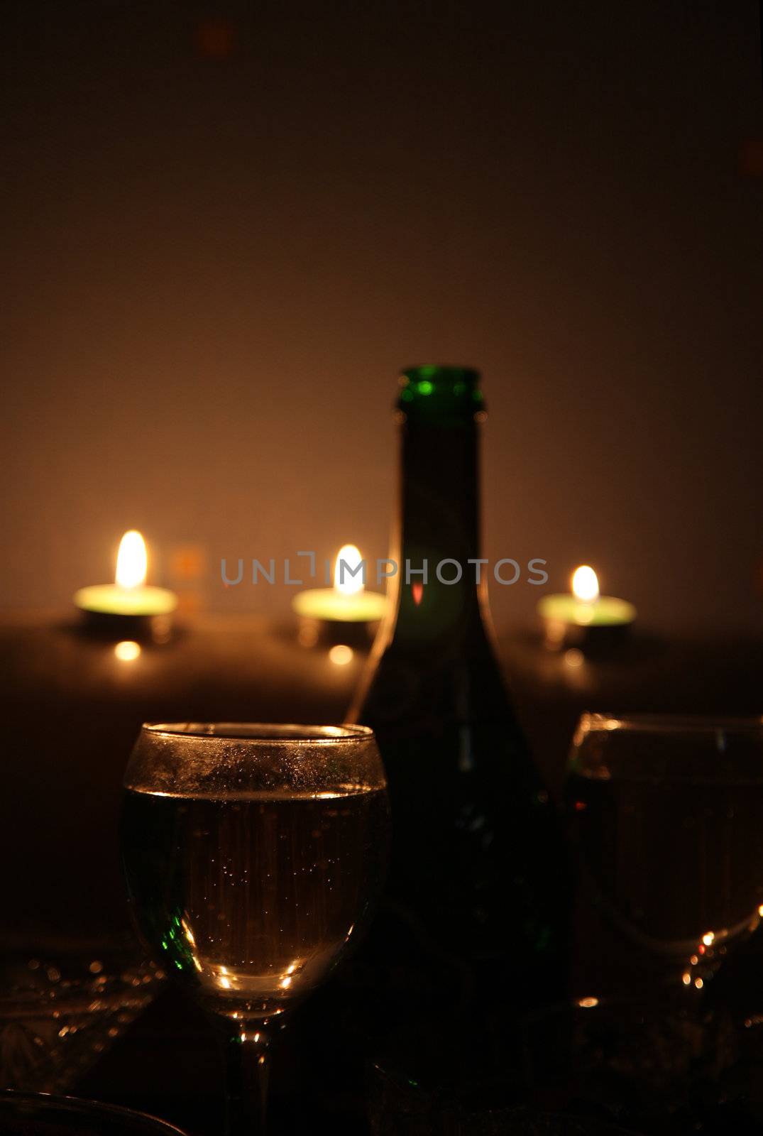 Romantic candlelight dinner with champagne