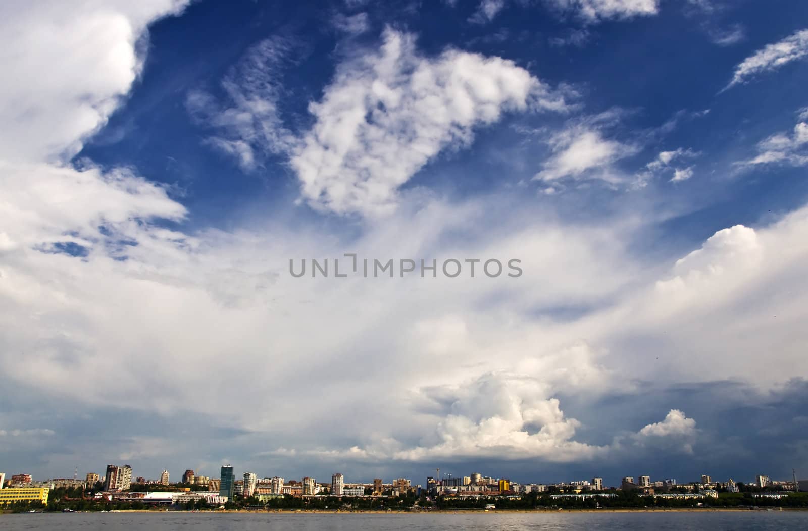 Sky with storm clouds over the port city. Samara, Russia. City Quay and beaches.