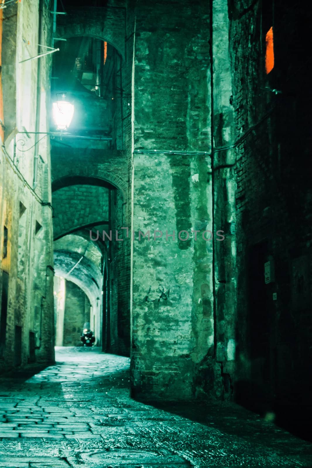 Night Alley in old city of Siena, Tuscany, Italy by PiLens