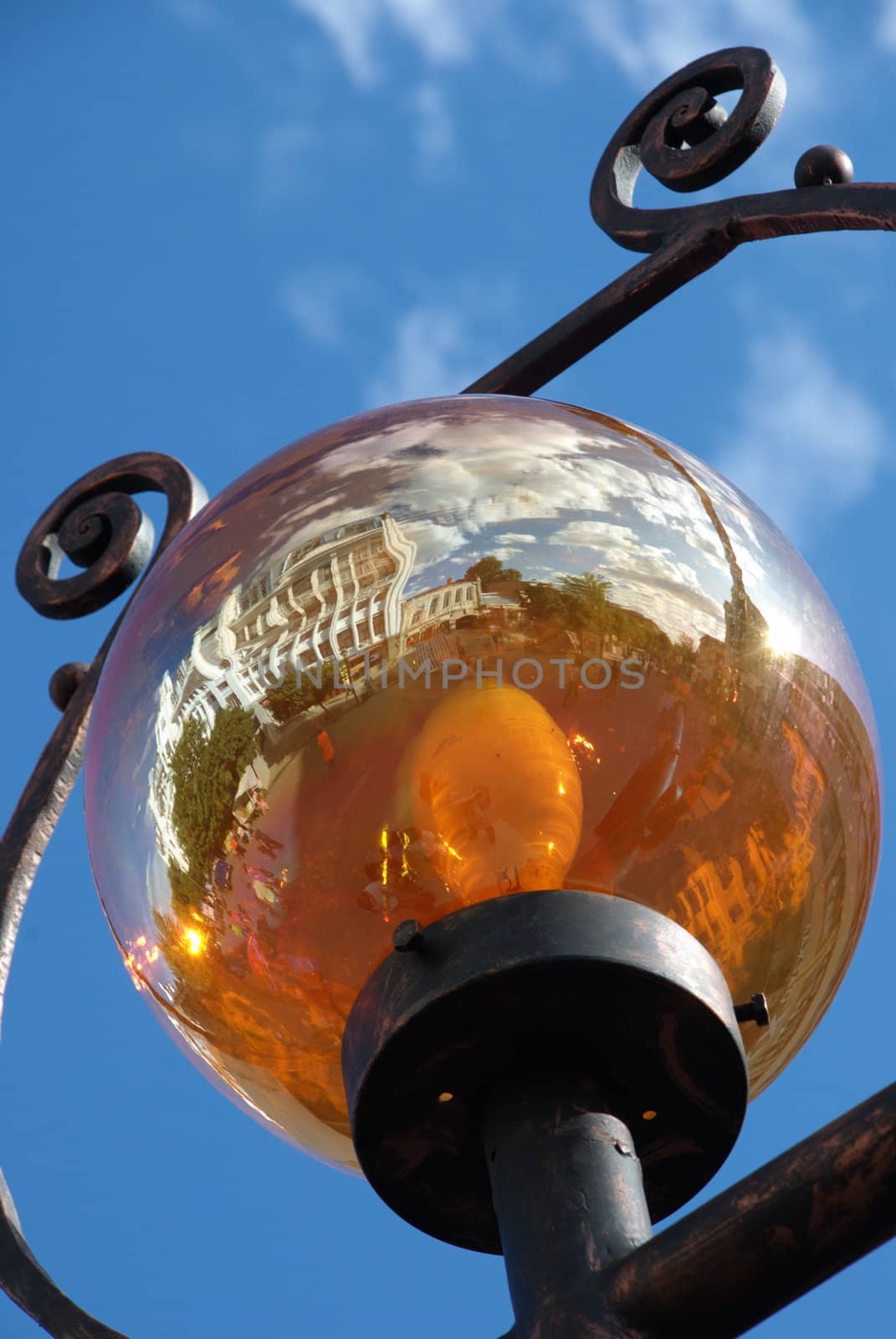 Street lamp in the form of a golden ball by Light