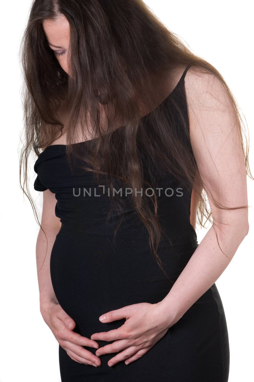Shot of beautiful pregnant woman isolated on white
