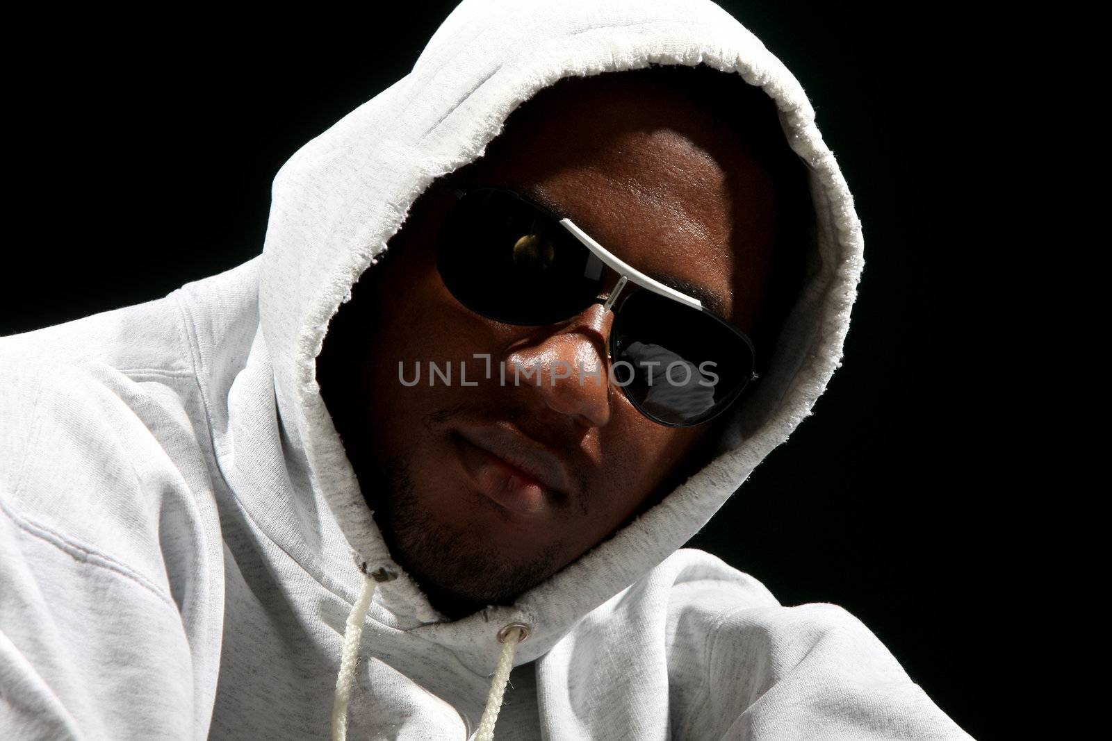 Young african american male on black background