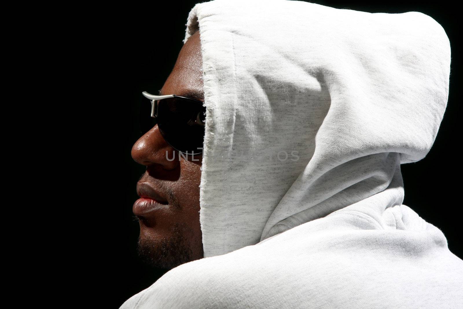 Young african american male on black background