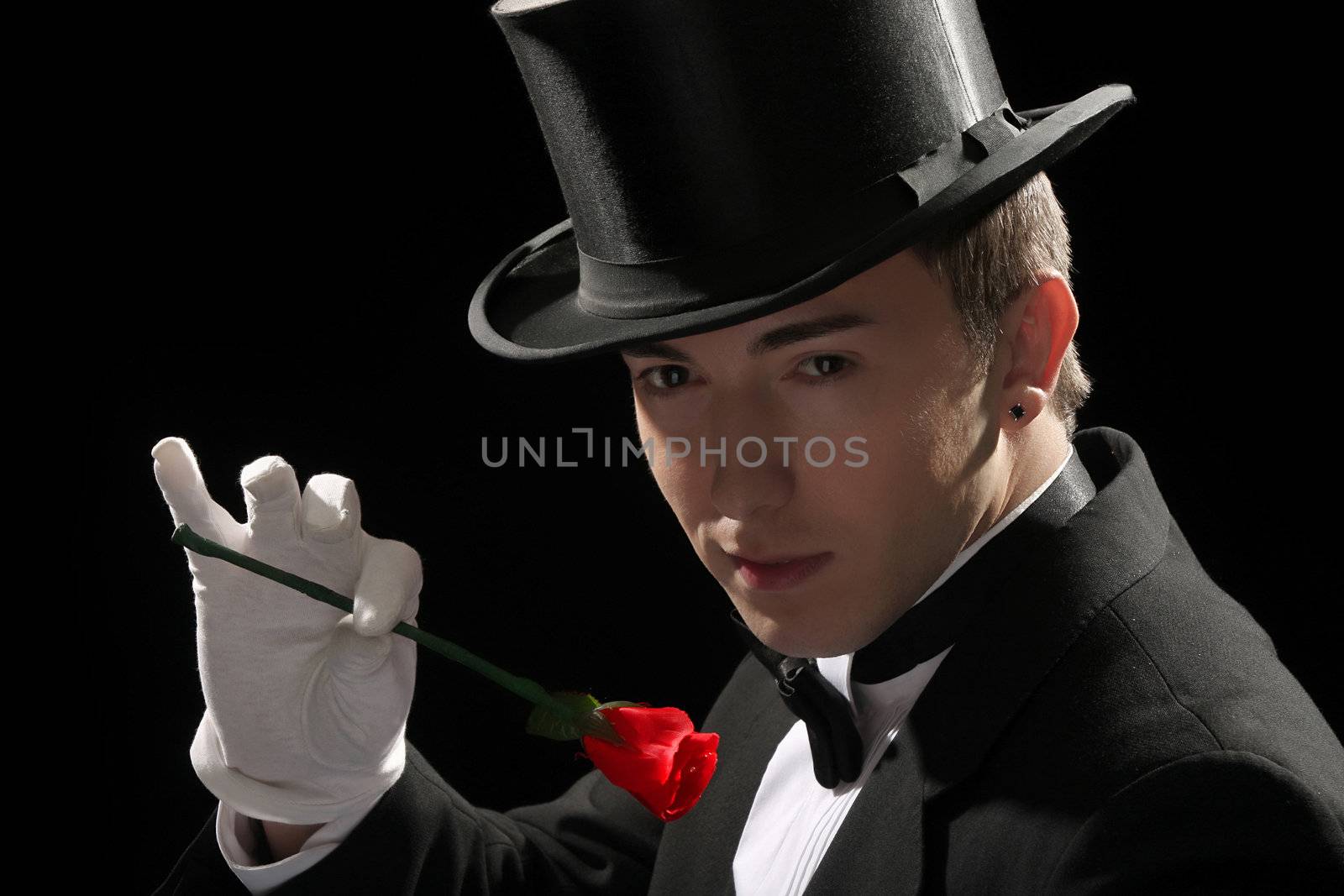 magician performing red rose by vladacanon