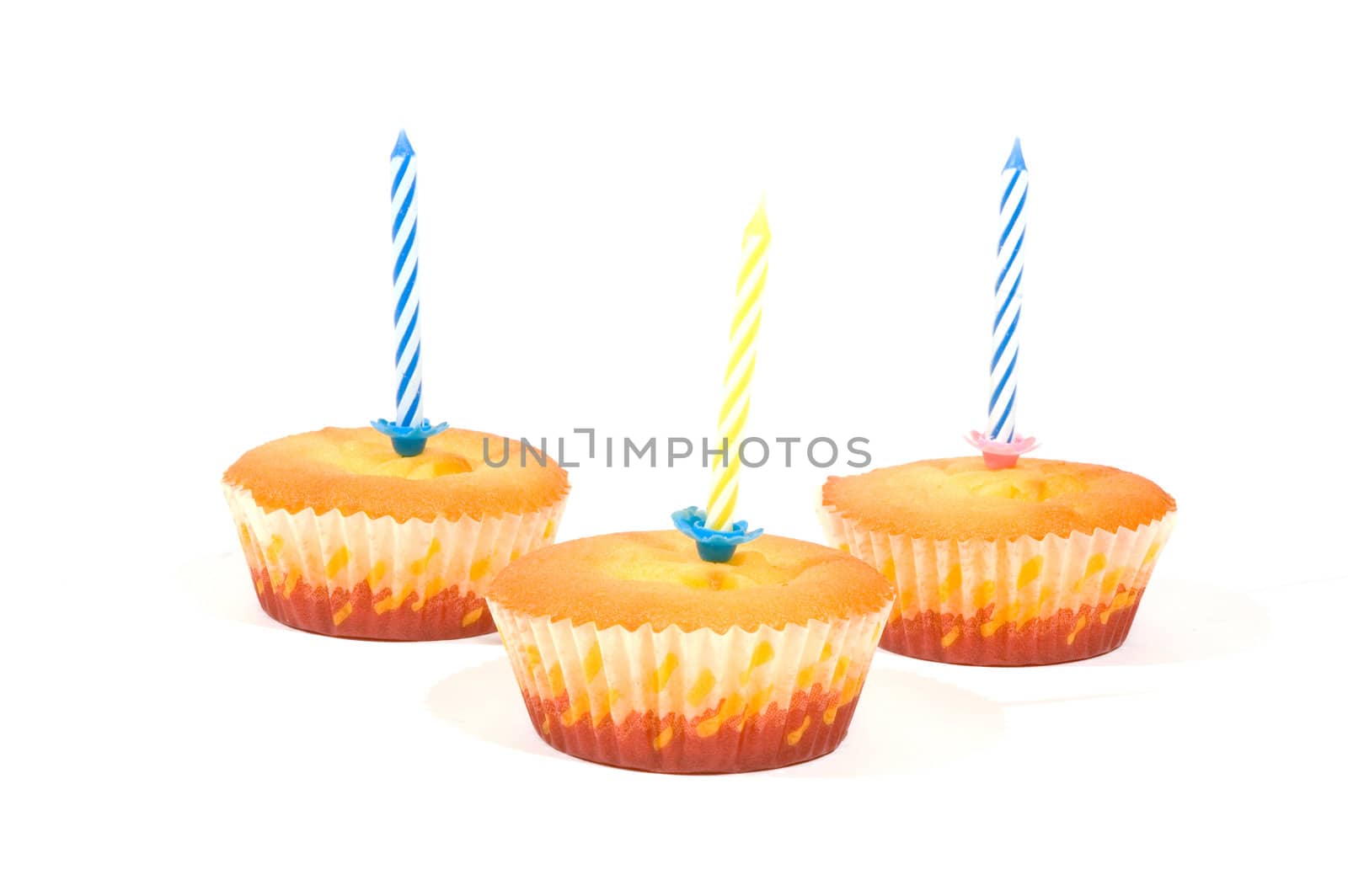 Birthday cupcake with candle isolated on white
