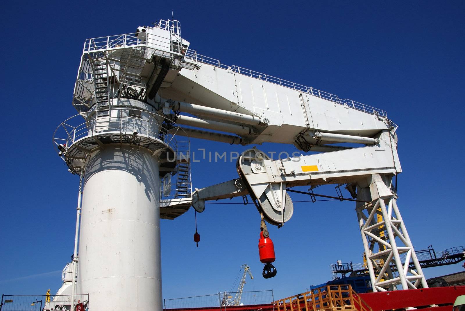 The powerful ship crane is in transport position