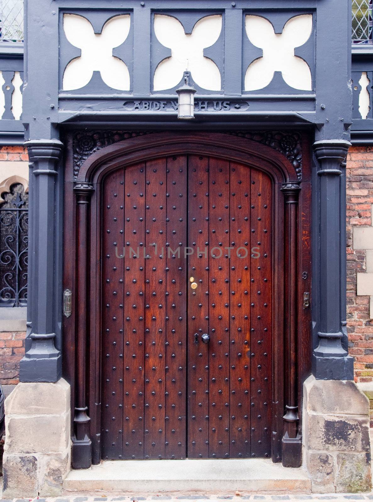 Ornate dark wood entrance door by steheap