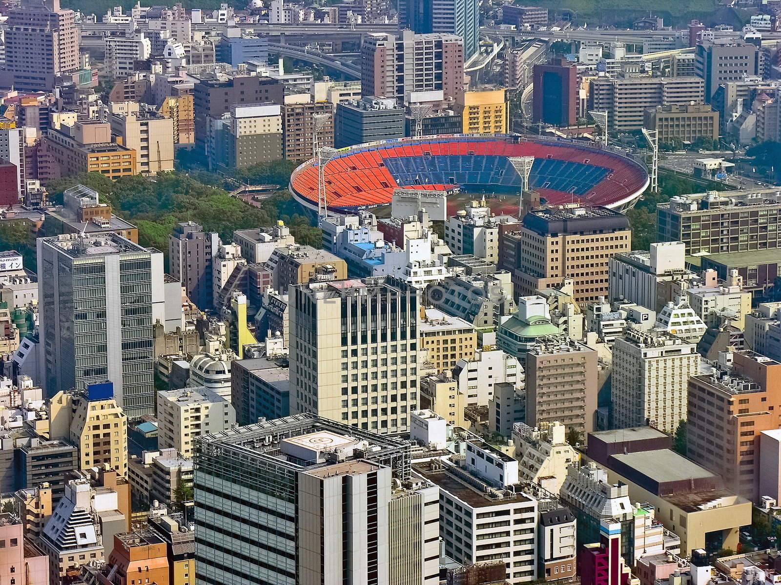 Urban city scape with stadium in the middle of downtown