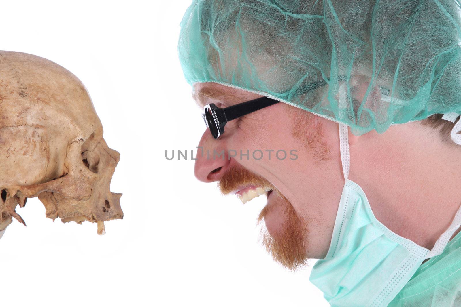 Details surgeon with skull on white background