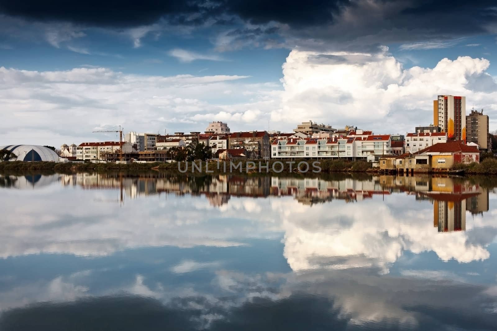 Reflection of an old fishing village by the river.