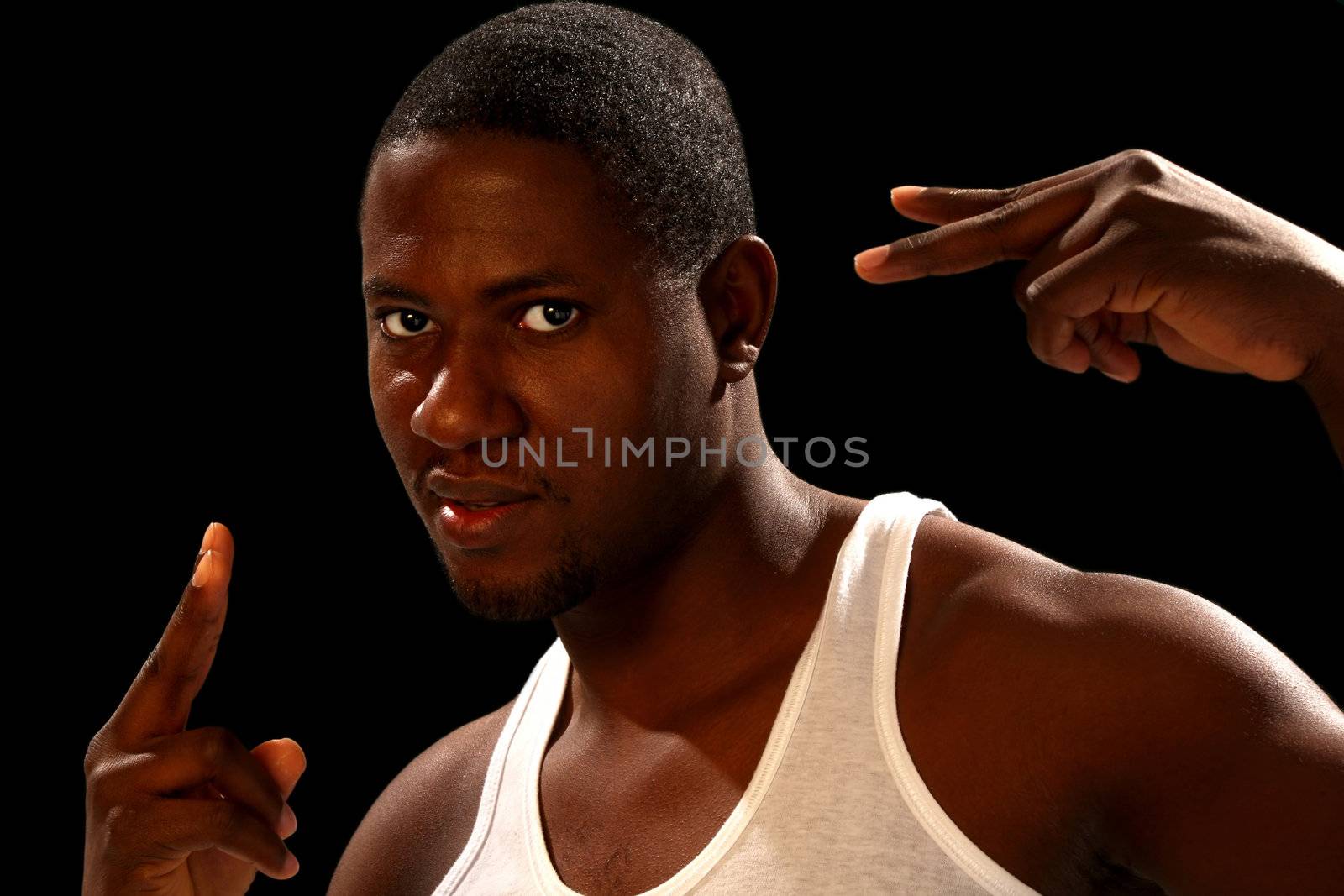 Young african american male on black background