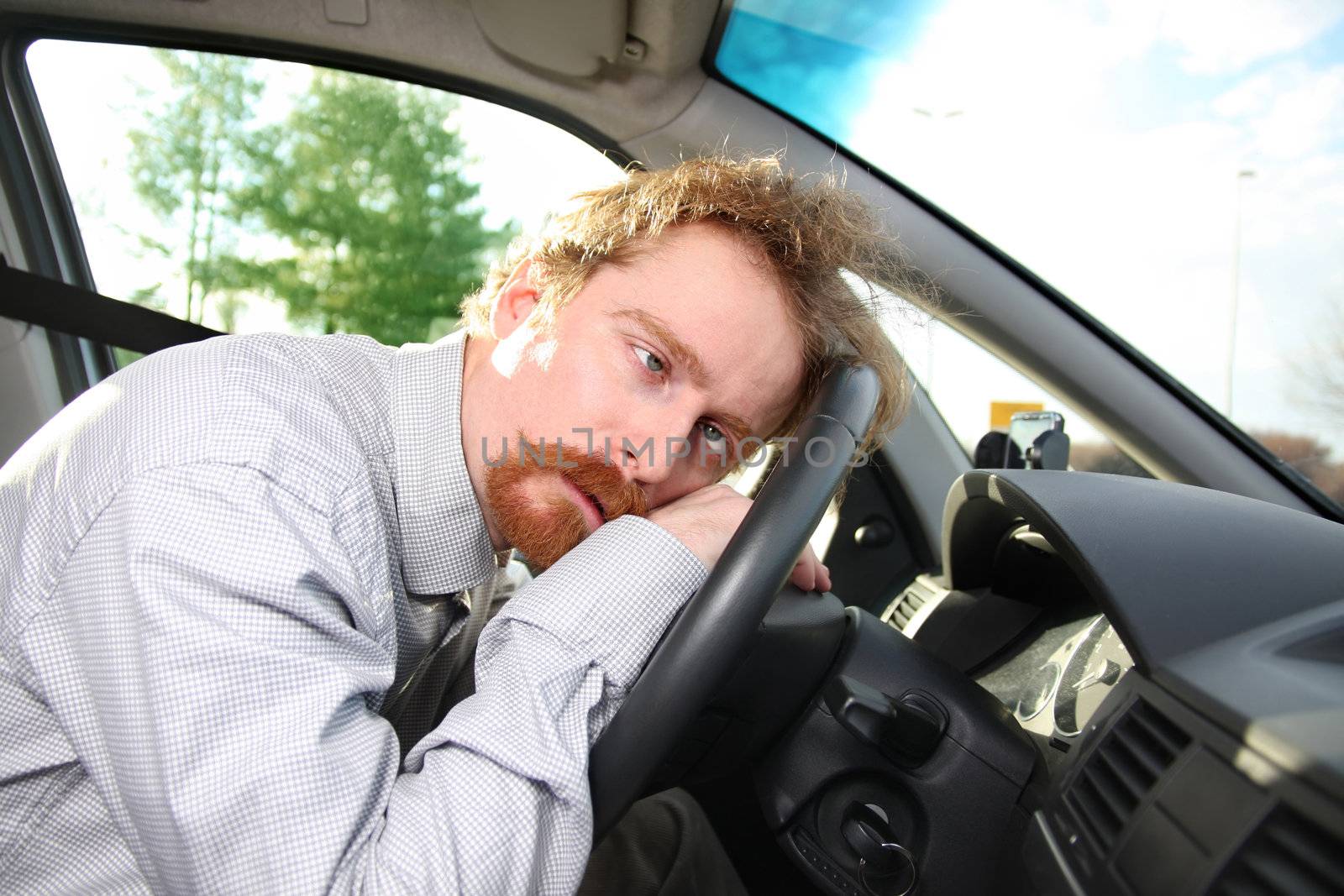 driver sleeps in a car by vladacanon