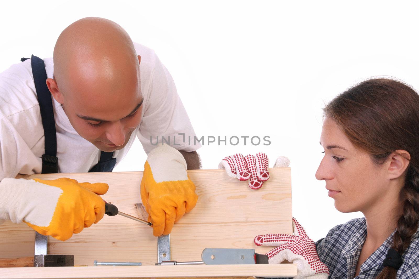 construction workers at work on white background 