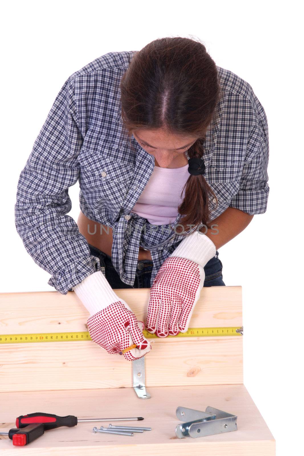 woman carpenter at work by vladacanon