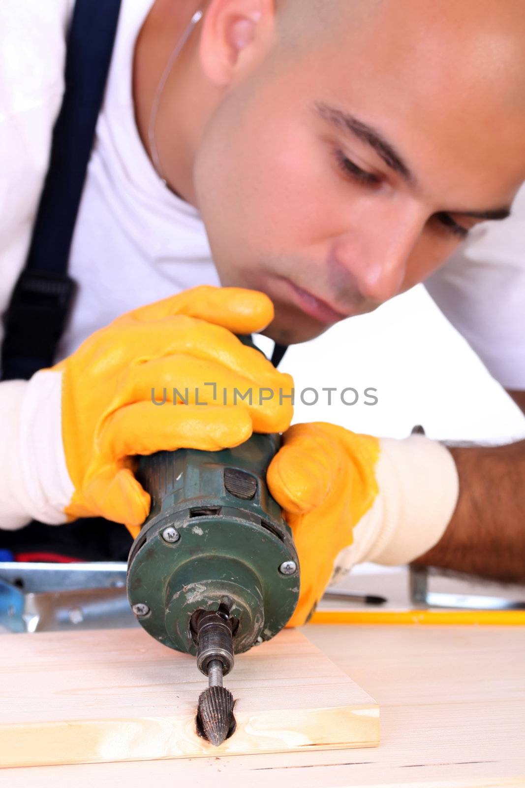 construction worker with milling machinist in closeup