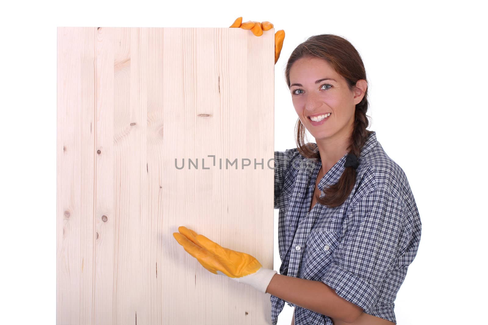 woman carpenter holding wooden plank on white background 