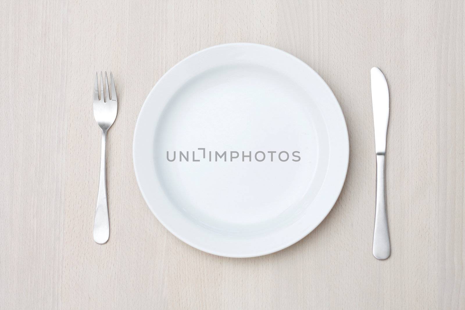 An empty plate on a table