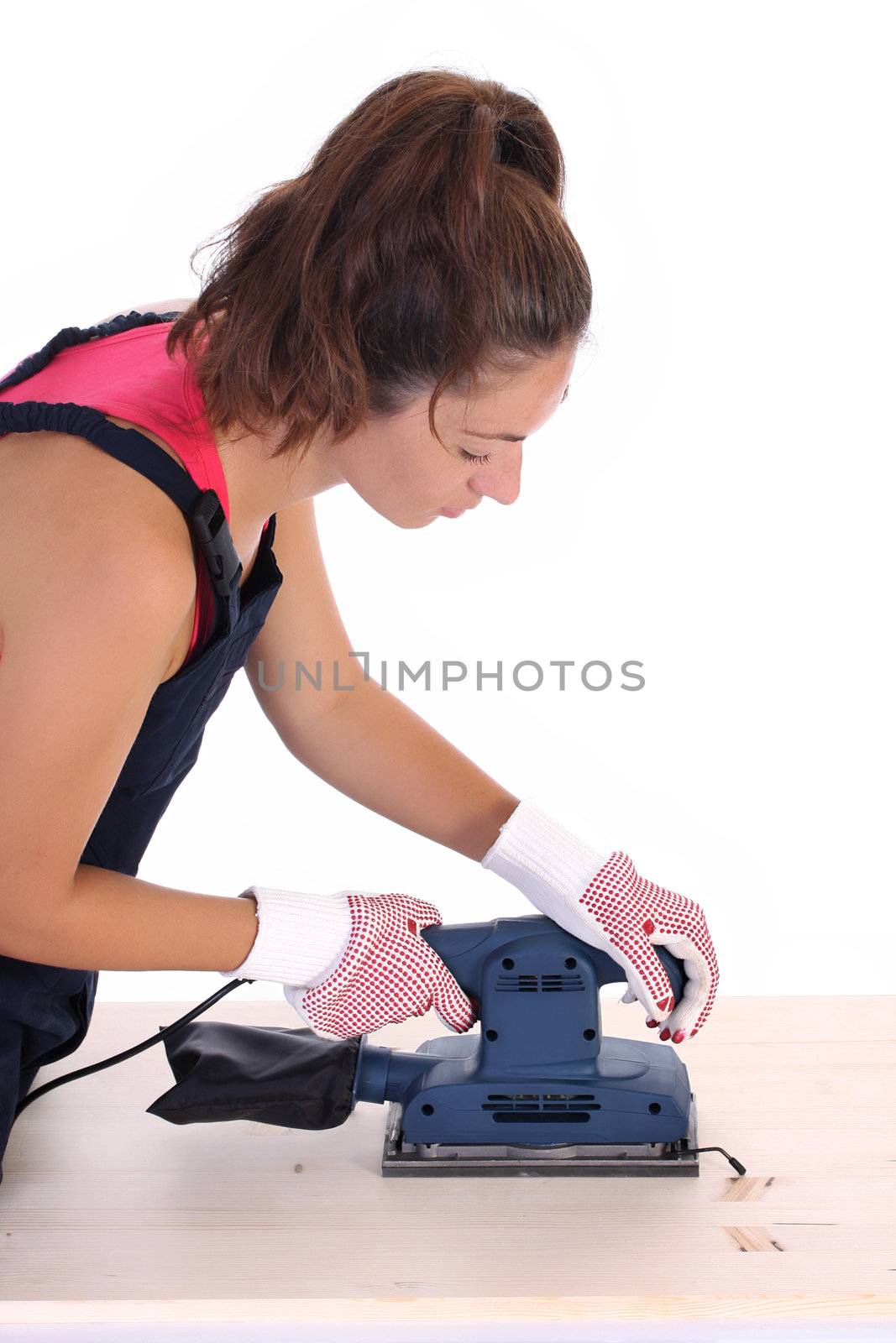 woman carpenter at work on white background 