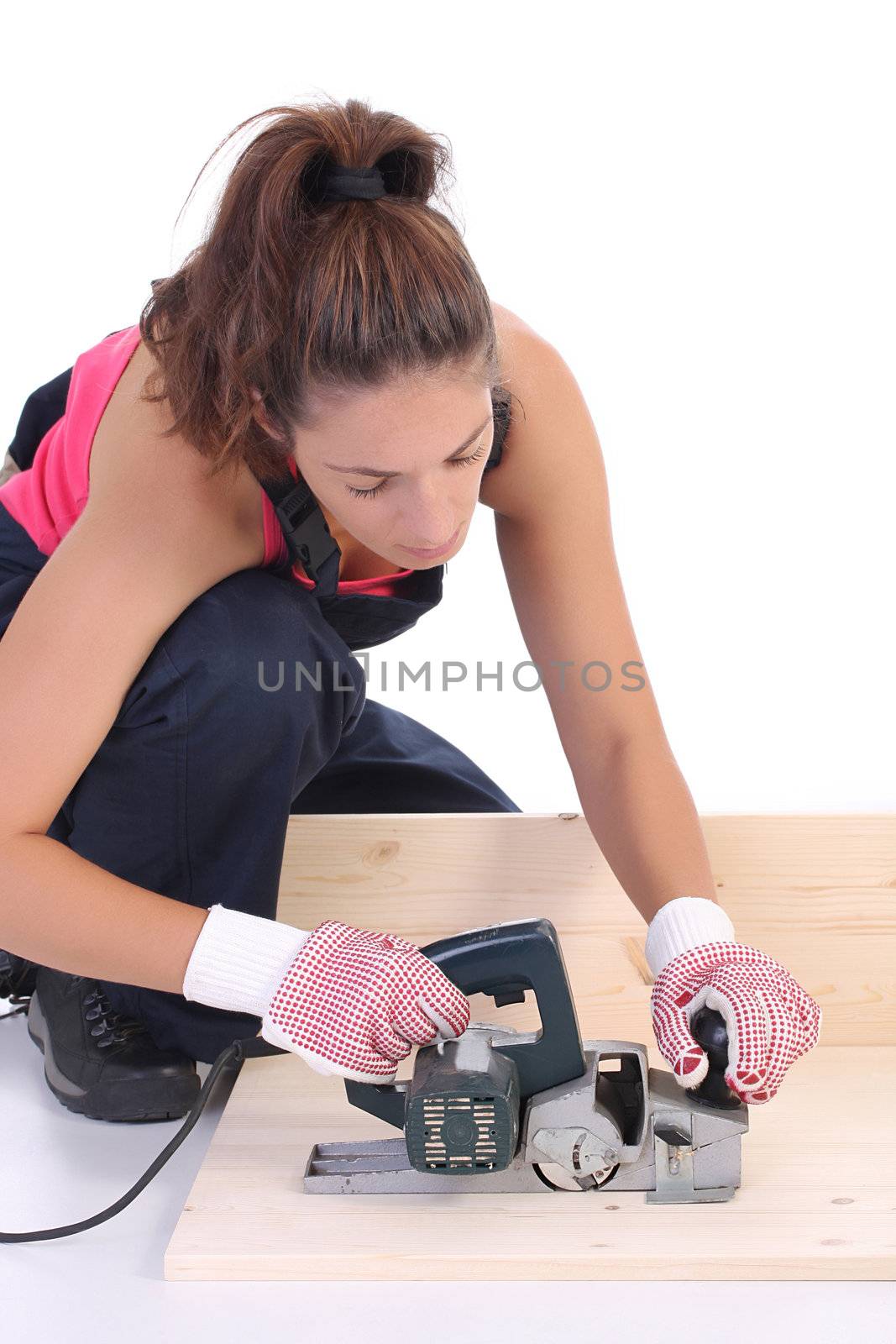 woman carpenter at work by vladacanon