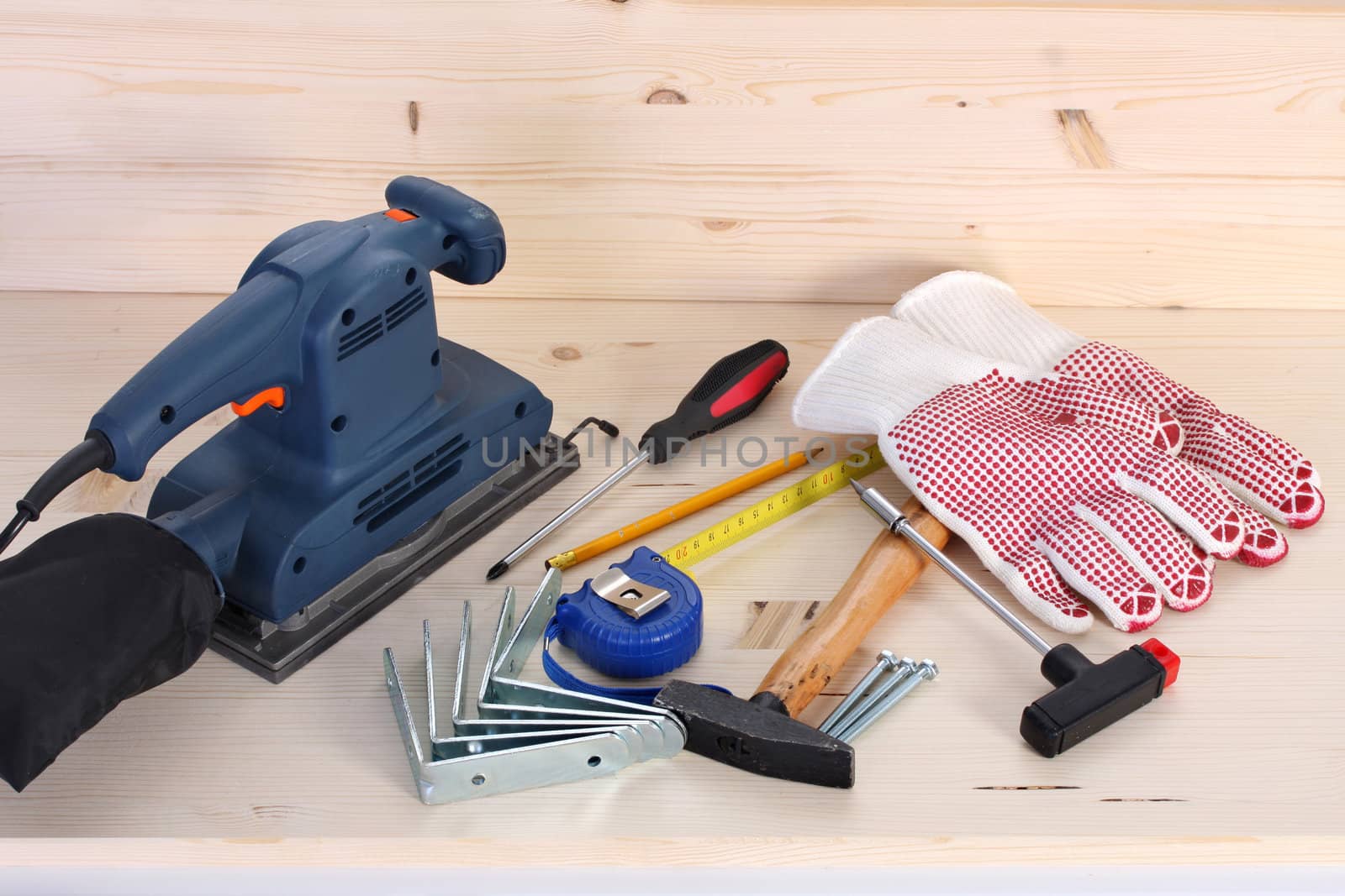 details of work tools on wooden plank