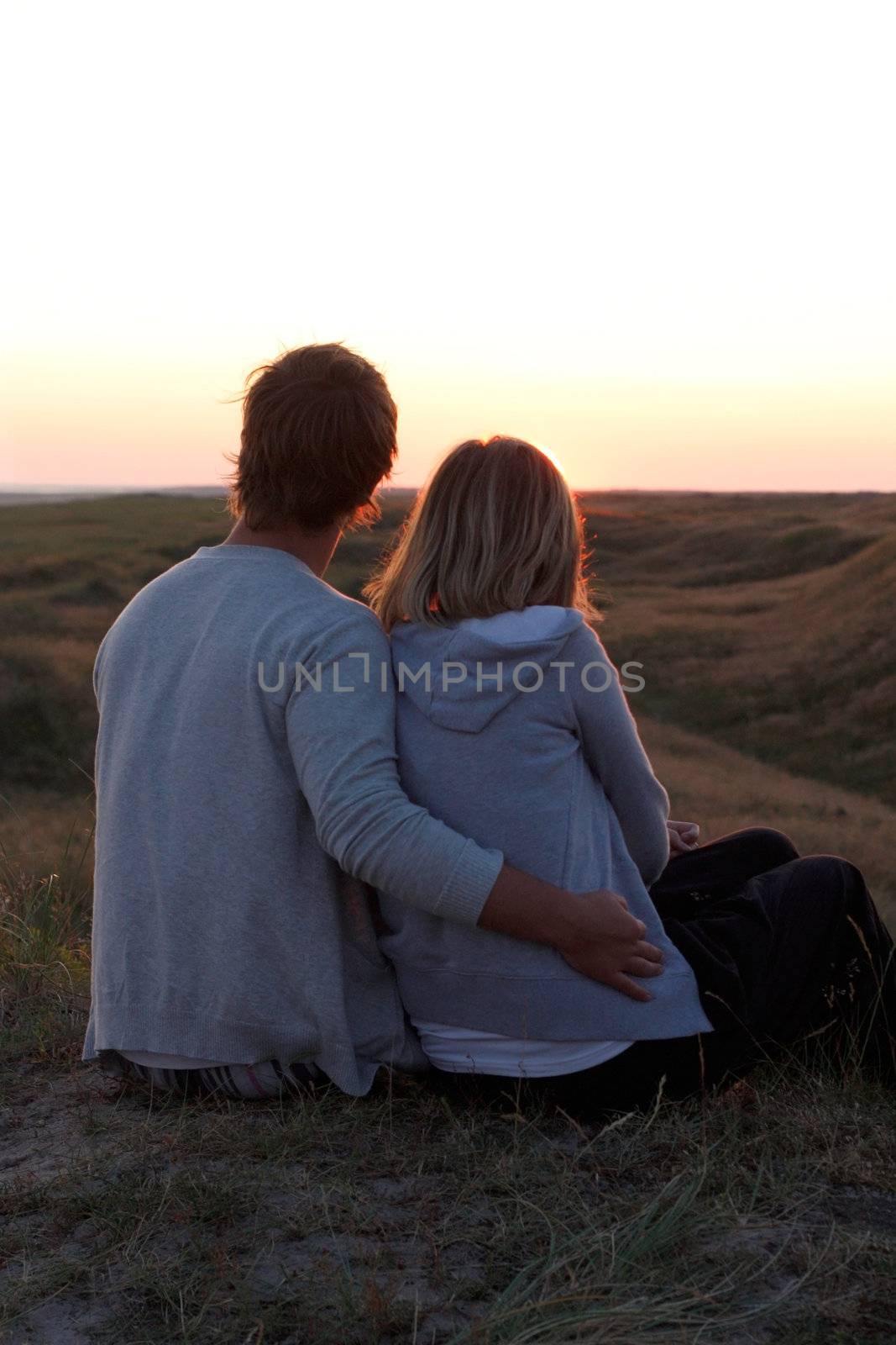 Couple holding hands