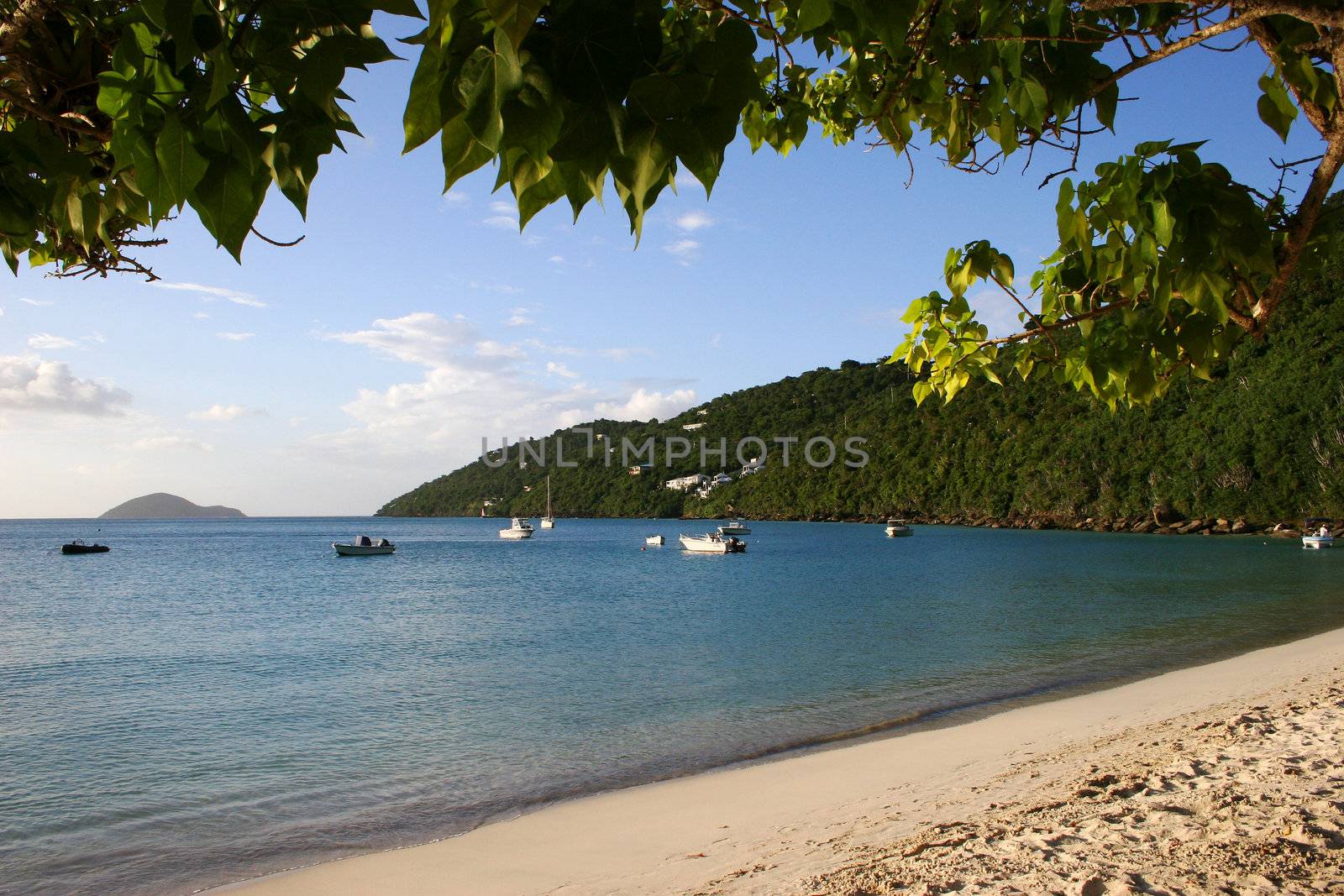 Water lapping the sandy beach on the island of St Thomas in the Caribbean