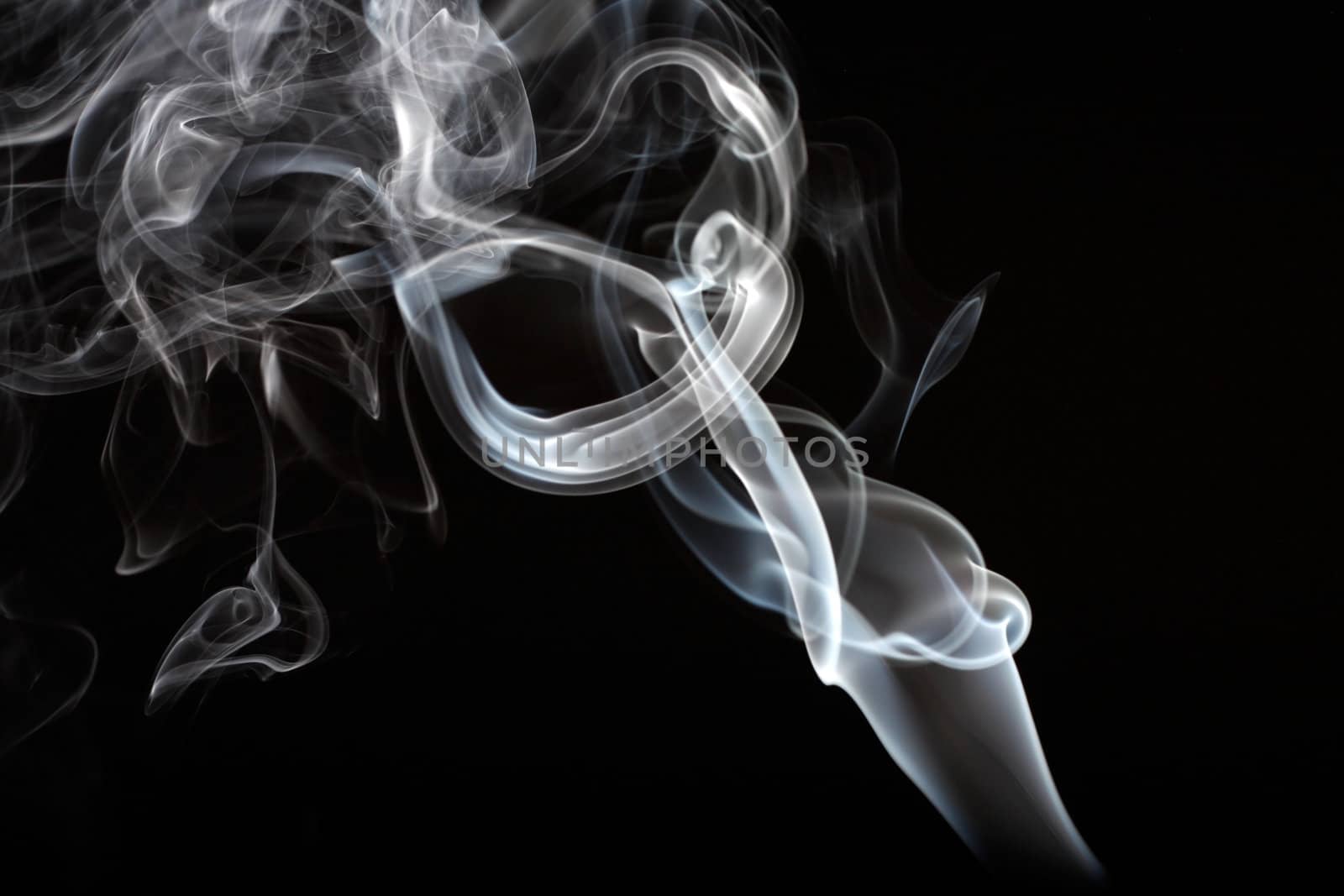 Abstract smoke curling and creating beautiful shapes