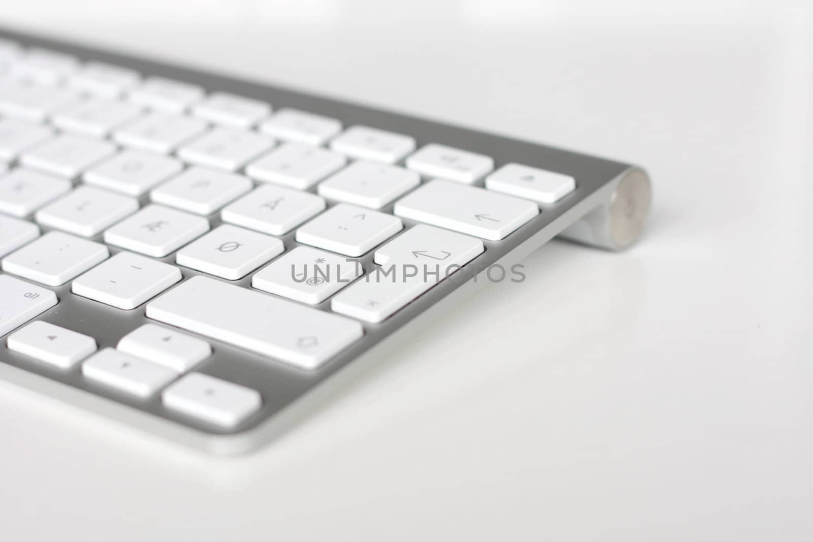 A keyboard with focus on the Enter key