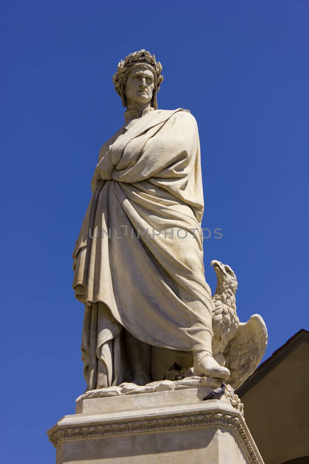 Dante's marble statue in piazza Santa Croce Florence Italy