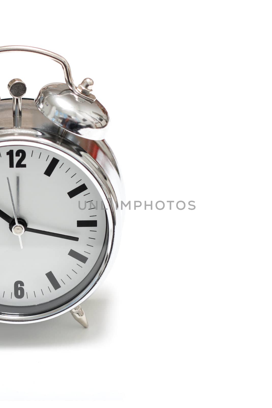 A half alarm clock in chrome