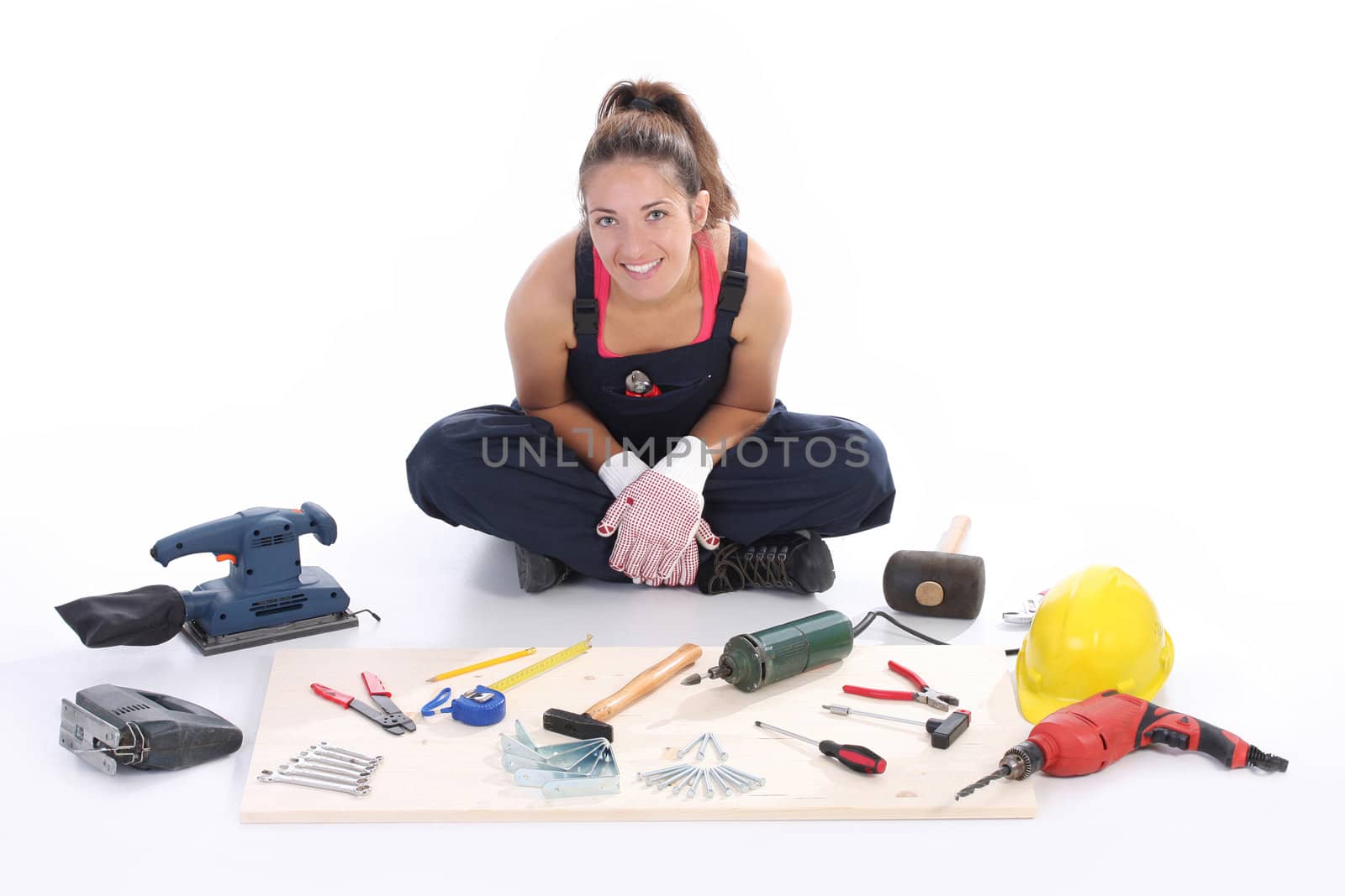 woman carpenter with work tools by vladacanon