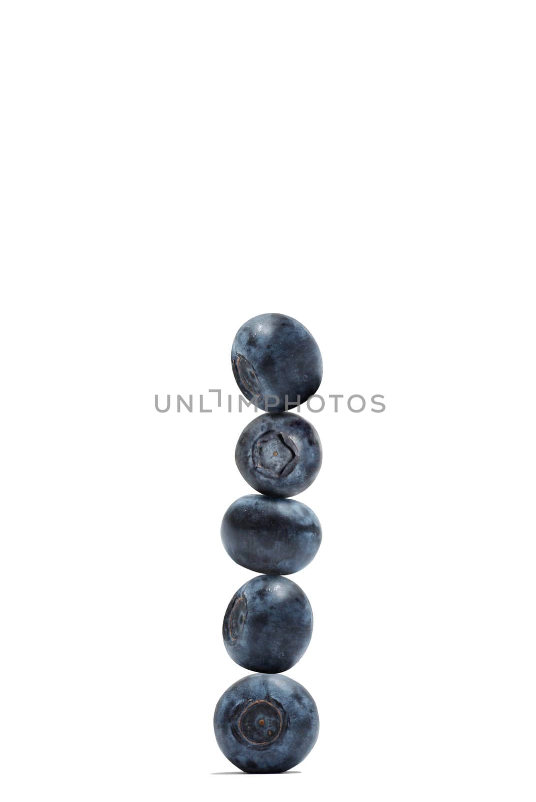 A stack of blueberries isolated on white