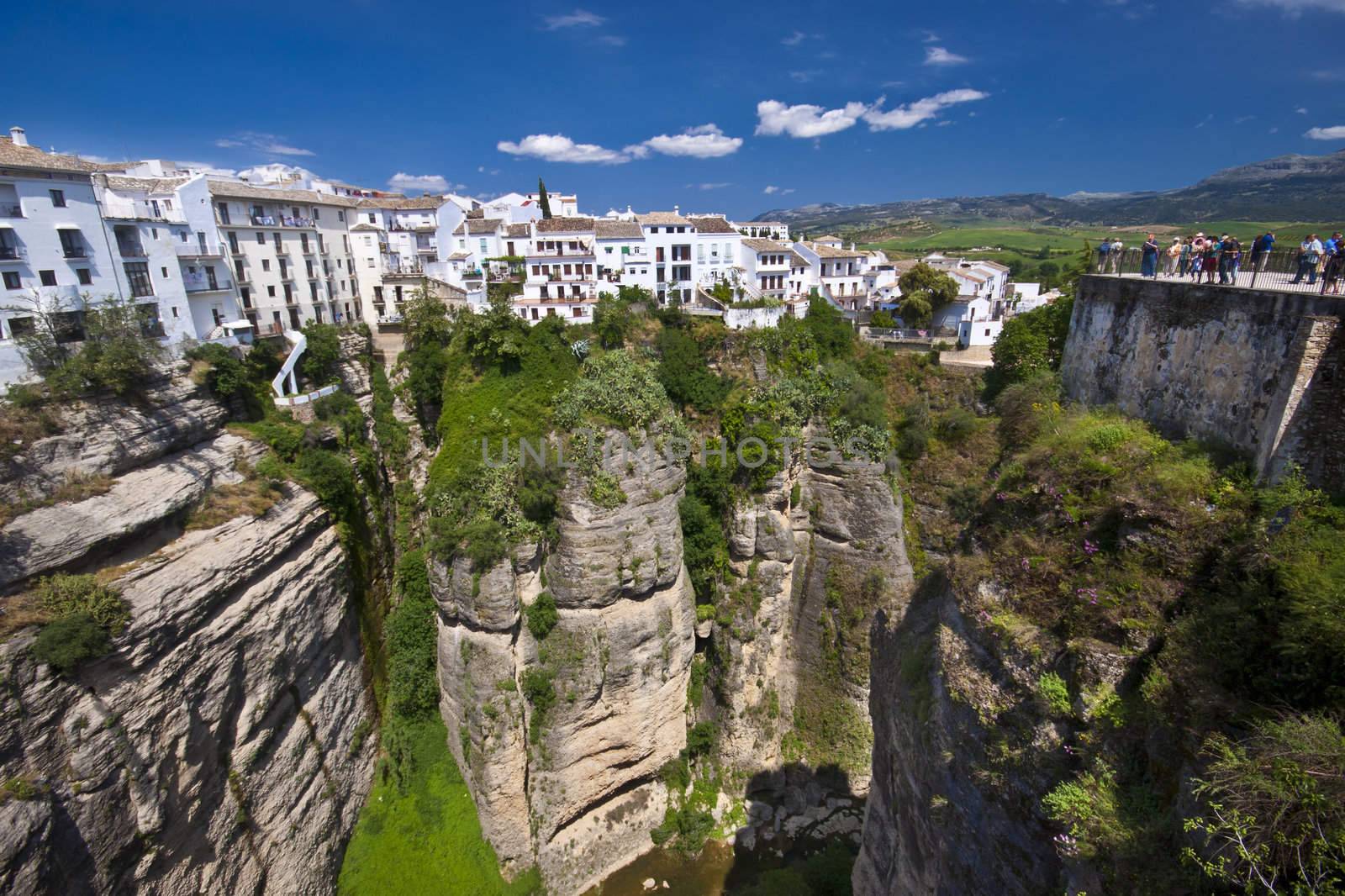 Panoramic view from a new bridge in Ronda, one of the famous white villages in Andalusia, Spain