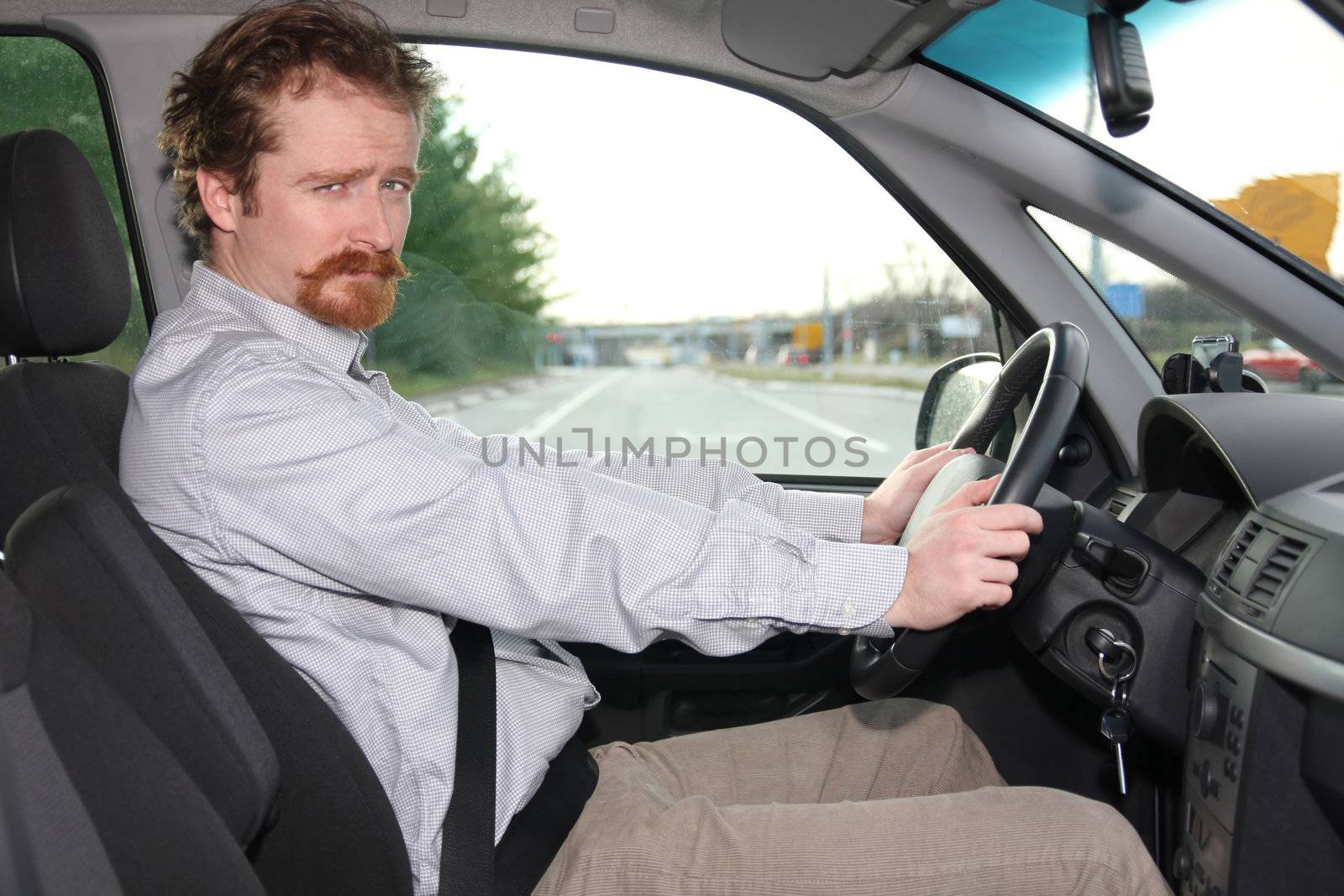 Businessman in the car, inside