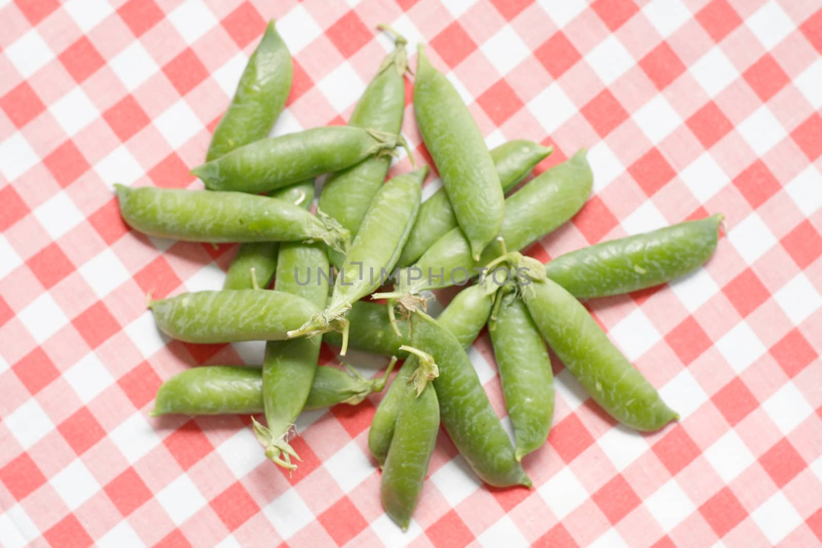 Peapods on a table