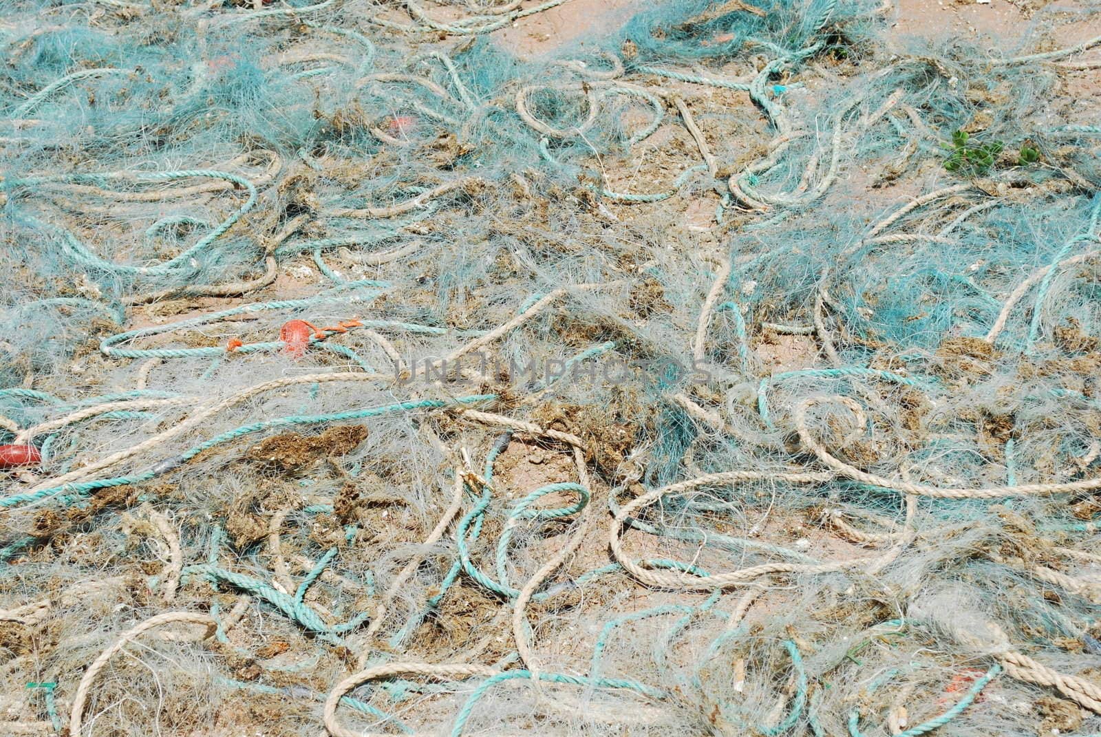 background of fishing nets in the port of Cascais, Portugal