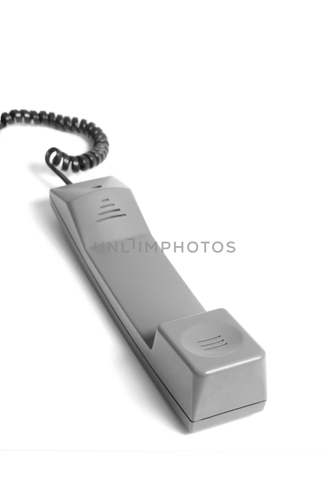 An isolated telephone handle on white