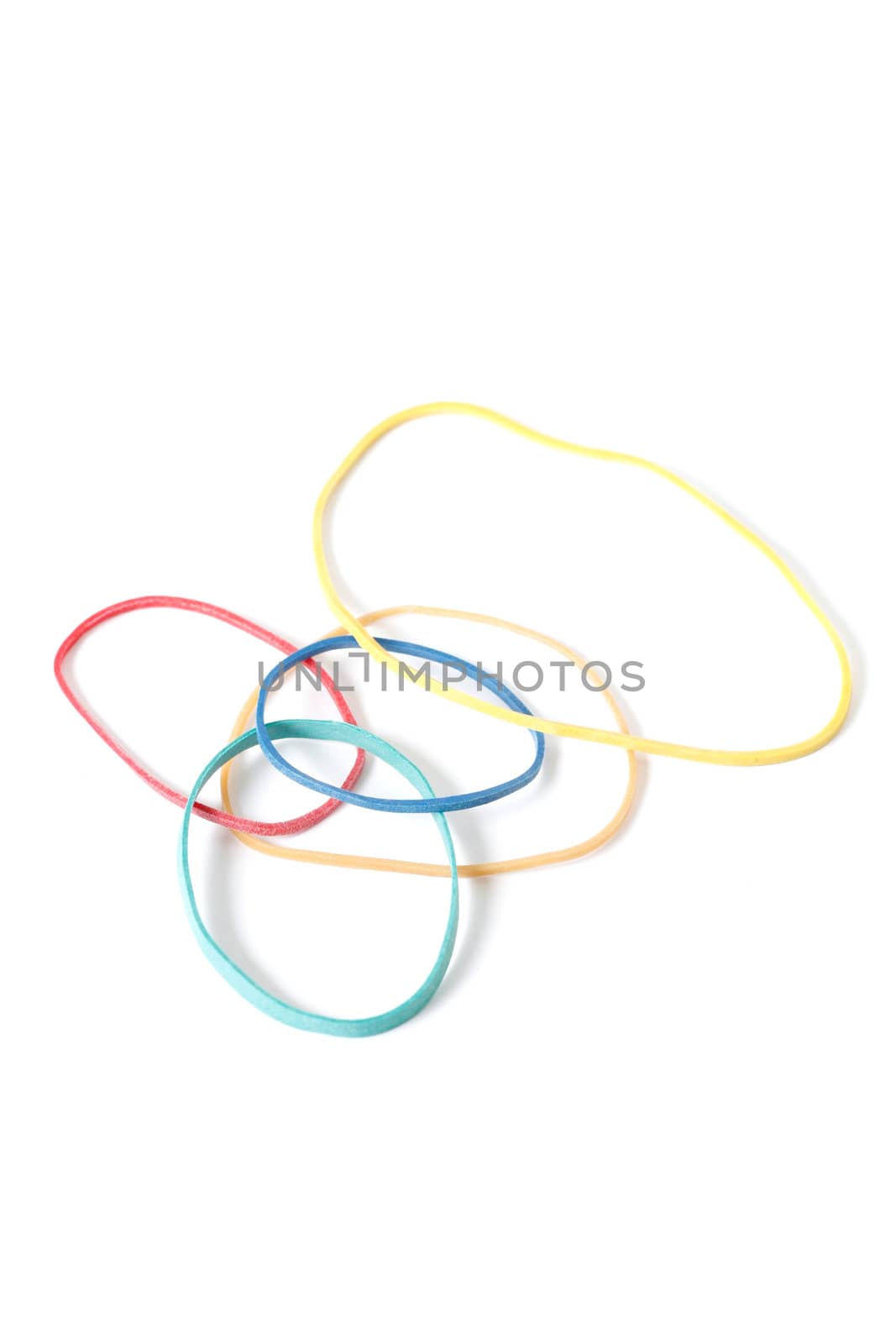 Multicolored rubberbands isolated on white