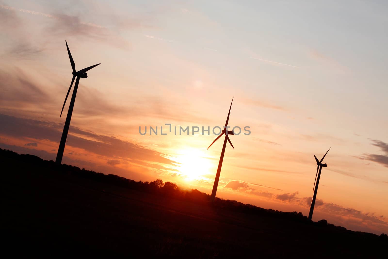 Windmills showing renewable energy in the evening