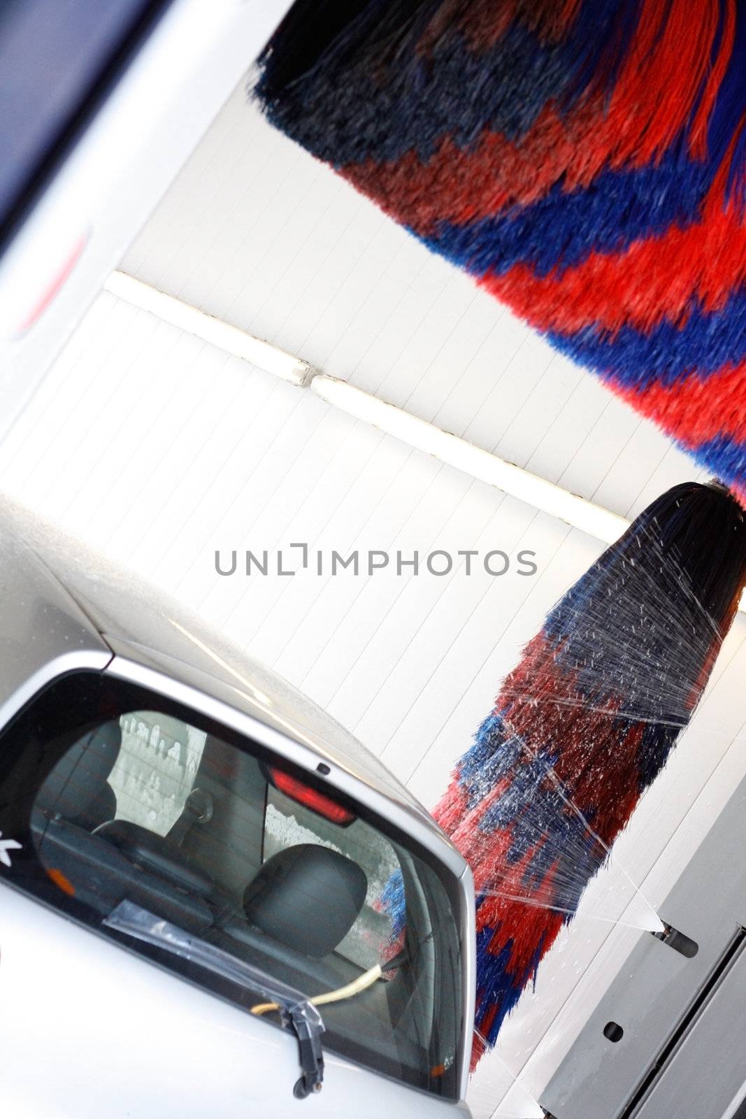 A car being washed in a car wash