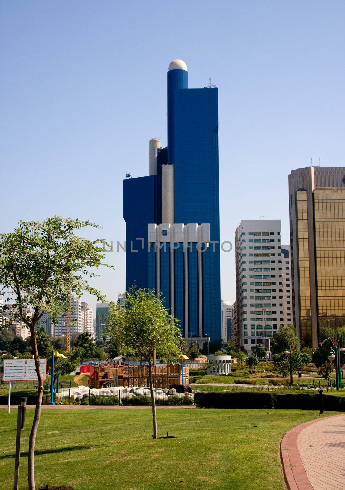 Vertical format of blue office building in Abu Dhabi in UAE