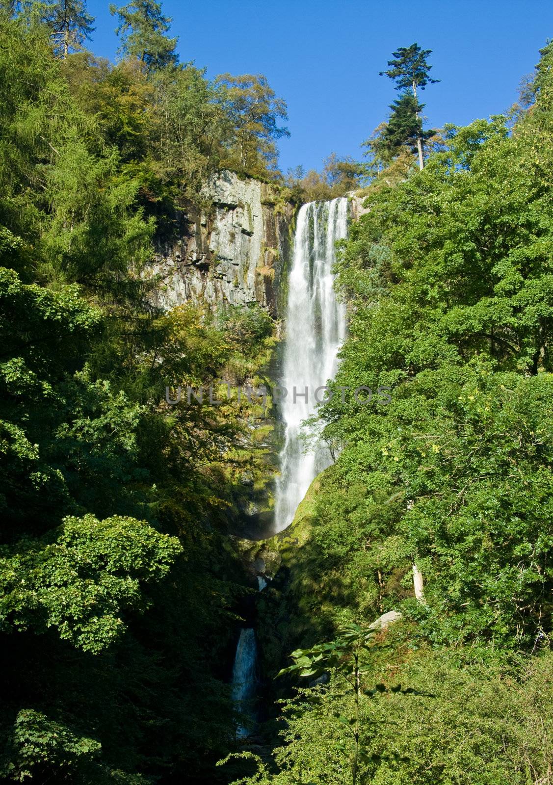 Vertical view of waterfall in Wales by steheap