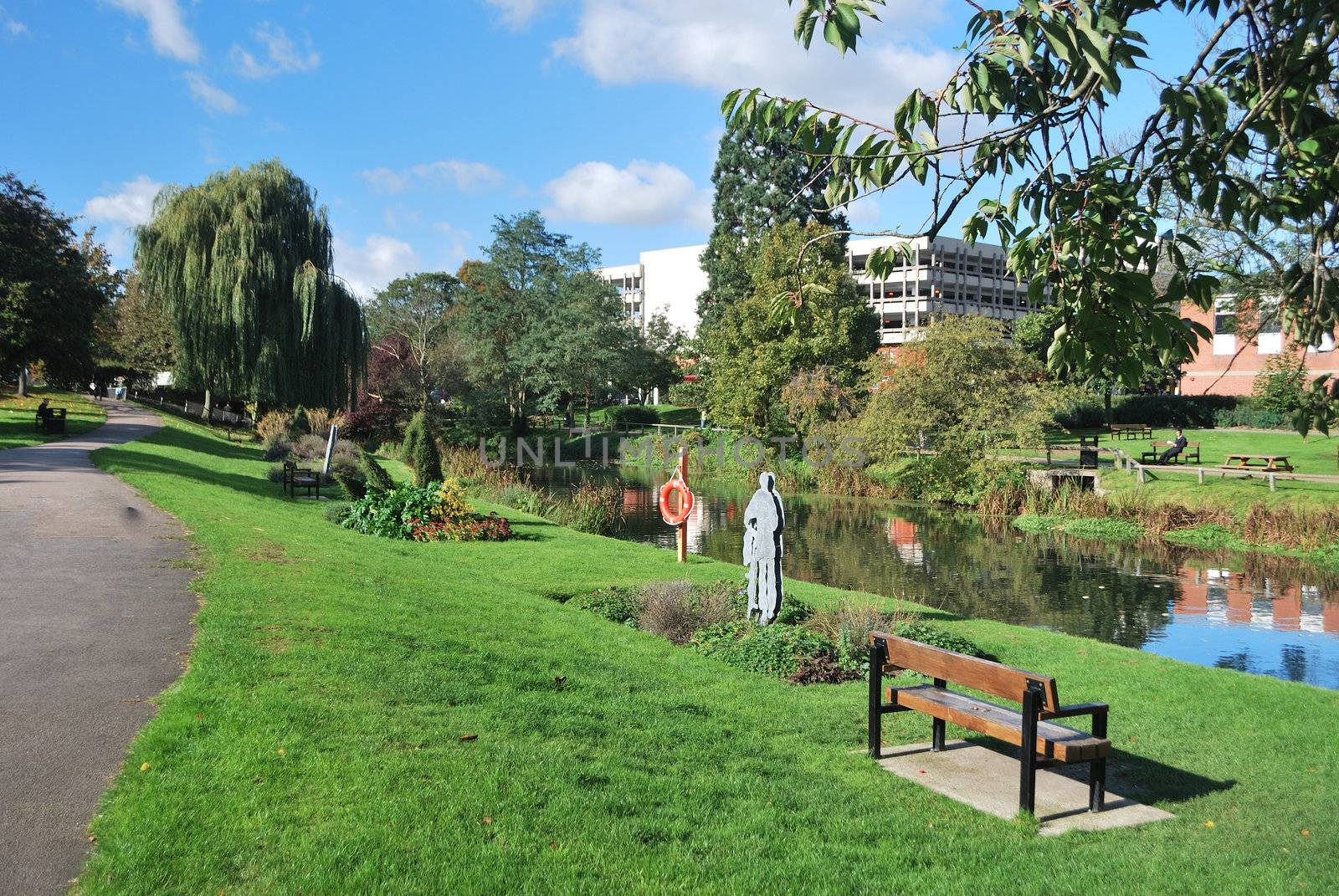 urban park with bench in foreground