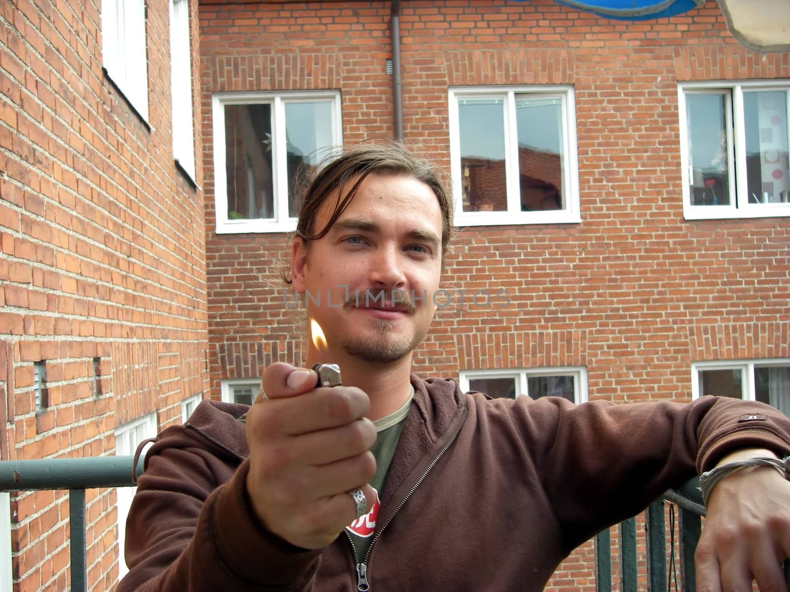 portrait of male model with lighter