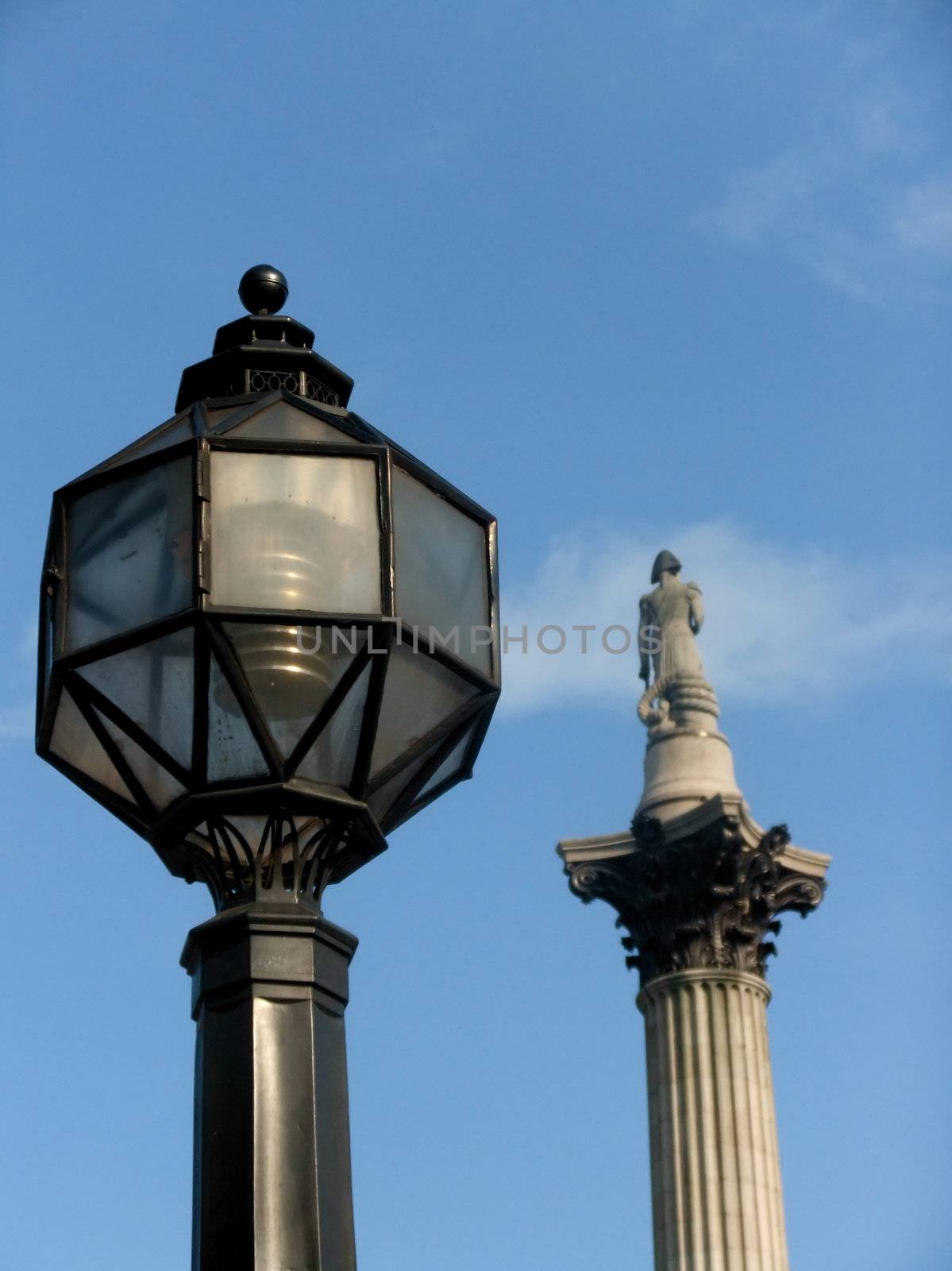 nelson column with streetlight in foreground