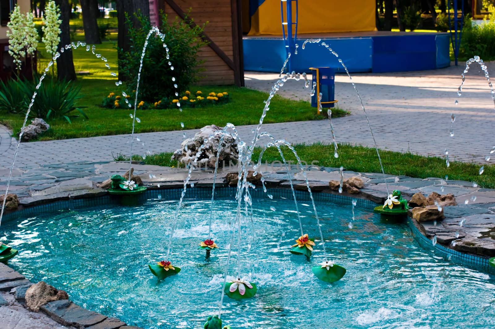 Small pond with a fountain by alena0509