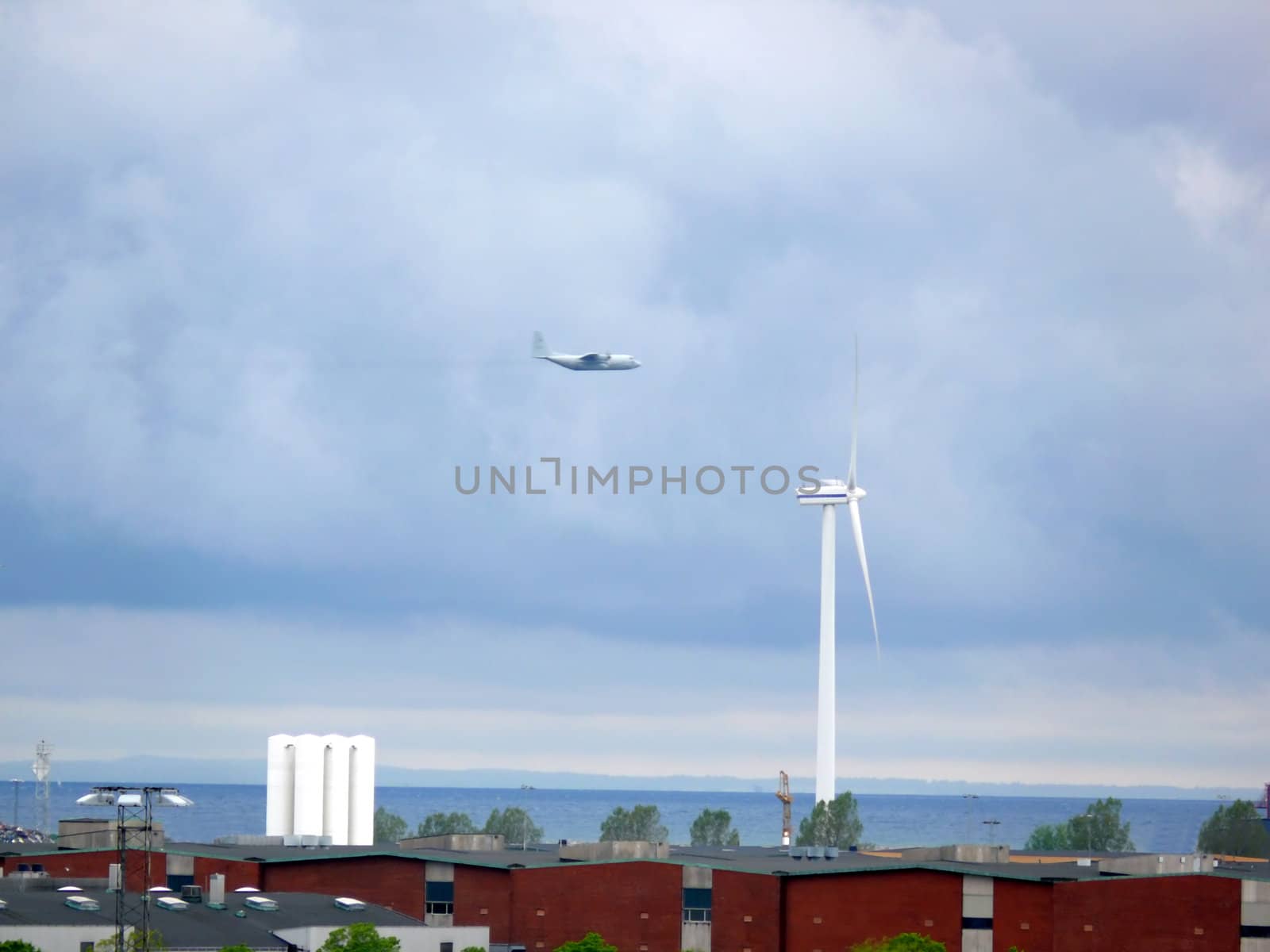 portrait of passanger plane fly at a low altitude